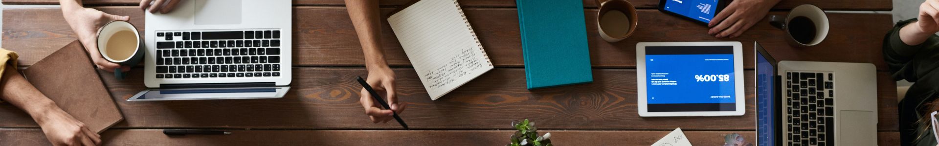 Solution Business Analyst - people at a desk